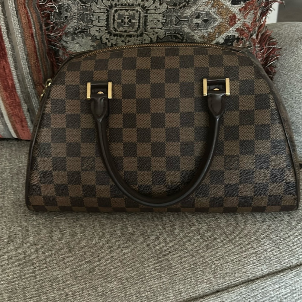 Louis Vuitton Ribera Handbag